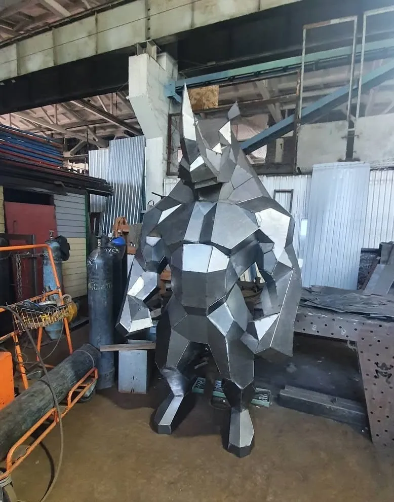 Customer-built low-poly steel Standing Rhino sculpture by BerlingDesign, Germany