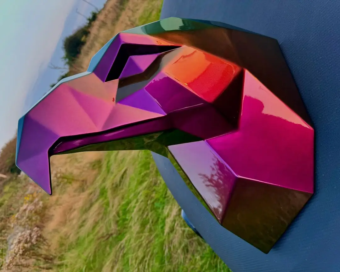 Mild steel low-poly sculpture with a glossy iridescent painted finish