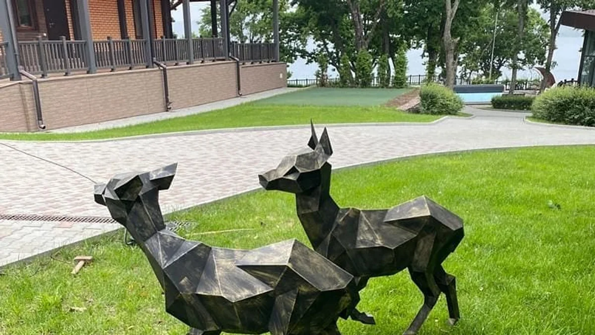 Finished welded low-poly steel Fawn Standing sculpture